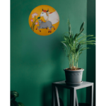 Beautiful Kamadhenu: Hand Painted Celestial Cow of Abundance Yellow Wall Plate on Green Wall - By Sanskruti Artz