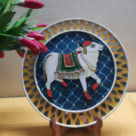 Beautiful Kamadhenu: Hand Painted Celestial Cow of Abundance Multi Colour Wall Plate with Background - By Sanskruti Artz