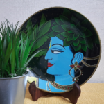 Beautiful Eternal Melody: Hand-painted Wall Plate with Krishna’s Serene Gaze Design By Sanskruti Artz 7